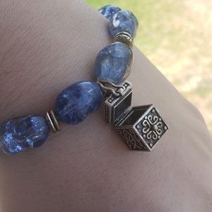 Cracked glass with box charm